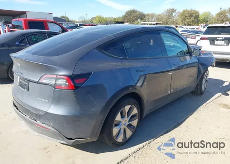 2022 Tesla Model Y Long Range Dual Motor All-Wheel Drive z USA, uszkodzony, nr VIN 7SAYGAEE1NF534290